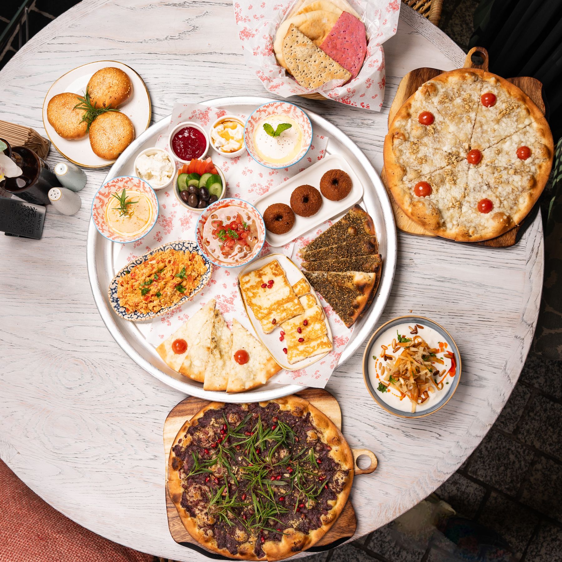 A colourful table spread of dishes